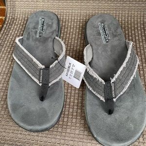 Skechers flip-flops never worn.